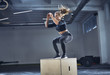 © Westend61 - Athletic woman doing box jump exercise at gym