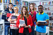 © blicsejo - Group of students learning in library at university