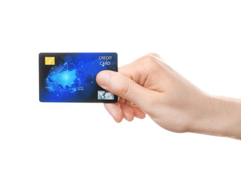 Wall Mural - Young man holding credit card on white background