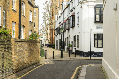 Fotografie, Tablou Empty street in Kensington and Chelsea London United Kingdom with houses cars an