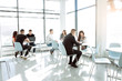 © Kseniia - Business people in modern office