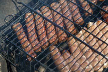 Sausage fire-roasted on the grill