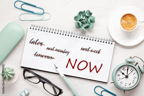 Cuadros en Lienzo Time management concept with notes in weekly organizer over the desk with coffee and alarm clock