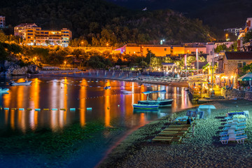 Wall Mural - Small fishing boats moored up the picturesque village on the Adriatic coast.