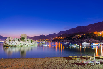 Wall Mural - A picturesque island near a cozy village on the shore of the Adriatic Sea.