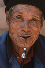 Old Man Smoking Pipe
