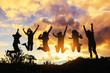 © AungMyo - silhouette of friends girls group jumping playing at sunset time