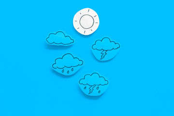Wall Mural - modern weather icons set on blue background top view copy space