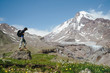 © zhushman/Stocksy - Handsome man hiking in the mountains