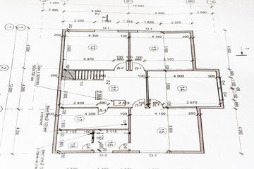 Wall Mural - The architectural plan of the house is printed on a white sheet of paper.