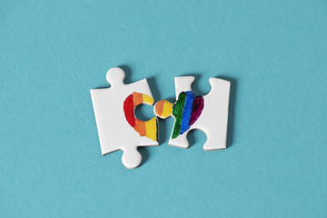 Canvas Print - puzzle pieces about to form a rainbow heart.