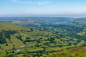 Wall Mural - aerial view of green farmland and fields in the rural welsh countryside