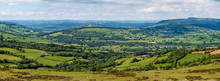 Panoramic Aerial View Of Green Farmland And Fields In The Rural Welsh Countryside