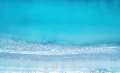 Wave on the beach as a background. Beautiful natural background at the summer time