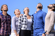 © ASDF - closeup.a team of young people looks up