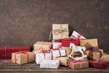 Poster - Christmas gift boxes on wooden table