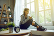 © uinmine - woman fitness model resting after an intense workout in home,flare light