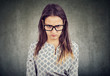 © Feodora - Young serious angry woman in glasses