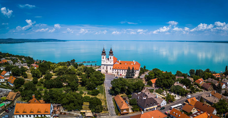 Wall Mural - Tihany, Hungary - Aerial panoramic view of the famous Benedictine Monastery of Tihany (Tihany Abbey) with beautiful coloruful Lake Balaton at background