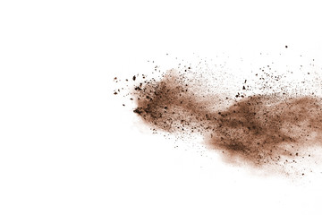 Brown powder explosion isolated on white background.