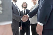 © ASDF - business people handshaking after good deal.