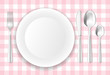 Table-cloth, porcelain plate and stainless cutlery