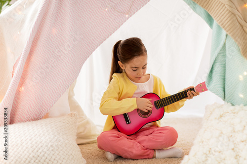 little girl toy guitar