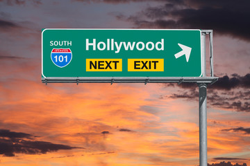 Wall Mural - Hollywood Route 101 Freeway Next Exit Sign with Sunset Sky