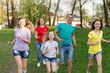 © Nadya Kolobova - Family playing football on the field. Family football