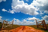 Fototapeta Konie - GATE CLOUDS SKY DIRT ROAD FARM AGRICULTURE