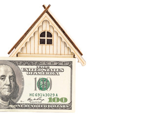 Wall Mural - Model of house with one hundred dollar bill. Isolated on white. Space for text.