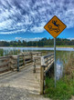 danger sign slippery pier in lillydale lake Melbourne Victoria Australia