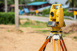 © SKT Studio - Surveyor engineer making measure at the land