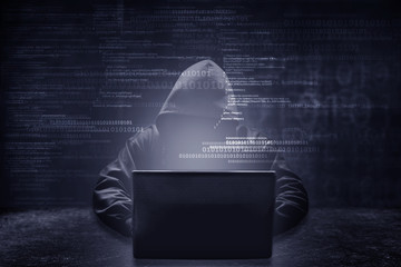 Wall Mural - internet crime concept. hacker working on a code on dark digital background with digital interface a
