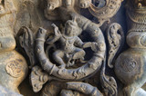 Fototapeta  - Carving details on the outer wall of the Kasivisvesvara Temple, Lakkundi, Karnataka, India