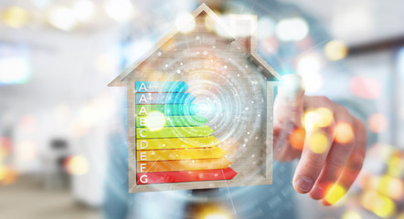 Wall Mural - businessman using 3d rendering energy rating chart in a wooden house