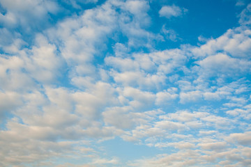 white fluffy clouds in deep blue sky