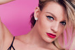 Pretty woman closeup beauty portrait, wearing red lipstick and eyeliner