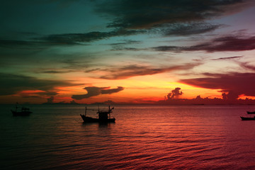 Wall Mural - night cloud sunset sky silhouette boat on sea