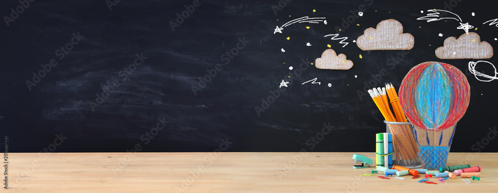 Obraz Back to school concept banner. hot air ballon and pencils in front of classroom blackboard. fototapeta, plakat