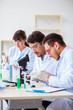© Elnur - Team of chemists working in the lab