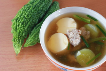 Wall Mural - soup with vegetables egg tofu and minced pork