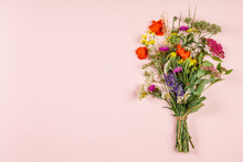 Wild Flower Bouquet On Pastel Color Background