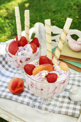 Sticker - Ice cream dessert with fresh strawberries and crispy wafer rolls.