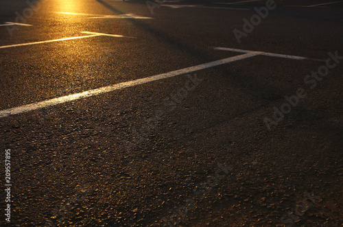 image of empty parking lot during sunset. asphalt background. Slika na platnu