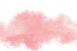 Leinwandbild Motiv abstract pink powder explosion on white background. Freeze motion of pink dust splattered.