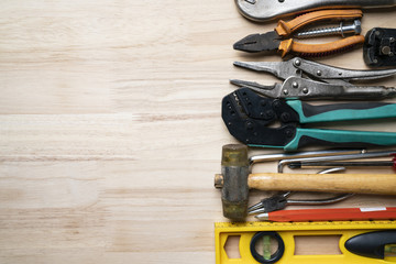 Wall Mural - Old tools equipment on wood table background, engineering concept