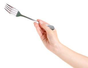 Fork in a hand on a white background isolation