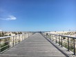 © Joe Trentacosti - A boardwalk leading to the beach at Robert Moses State Park on Fire Island, New York