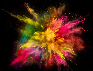 Wall Mural - Colored powder explosion on black background.